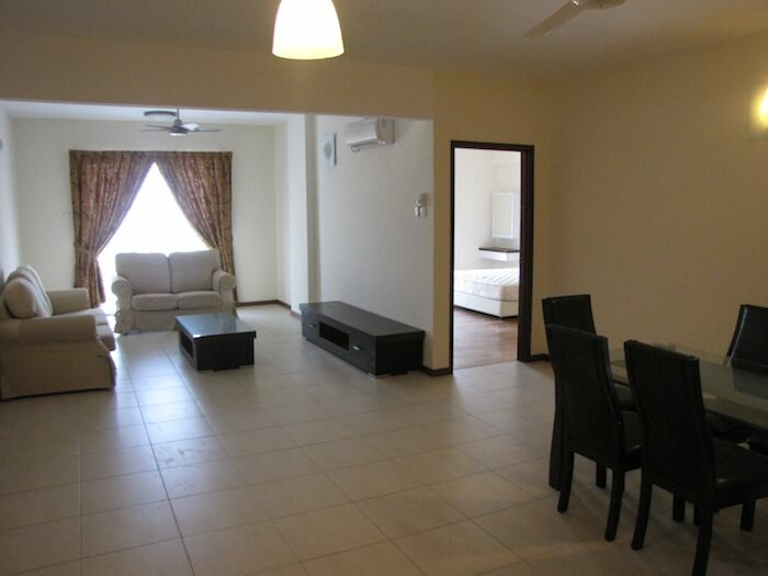 photo of the living room, dining room and bedroom in a Molek Pine condo